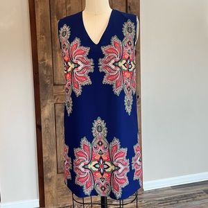 Nicole Miller mini dress in size large.  Zipper back.  Blue multi color